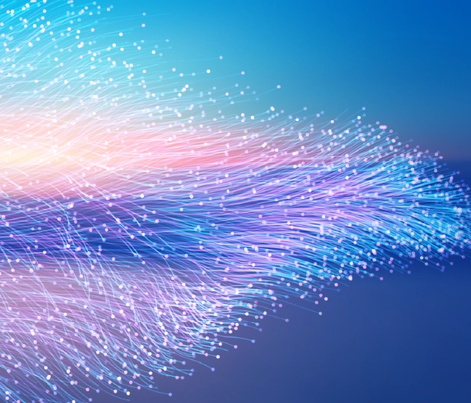 Colorful fiber optic waves representing Salesforce managed services scaling revenue beyond CRM maintenance